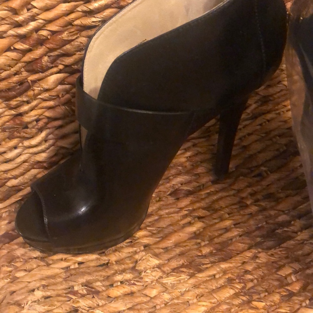 Designer black leather boots by Michael Kors